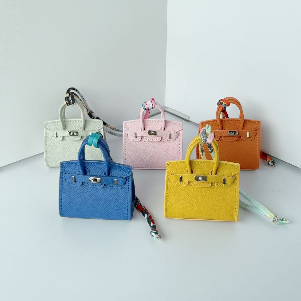 Mini Top Handle Bag Charm Keychain with Earphone Case in PU Leather detail image 1