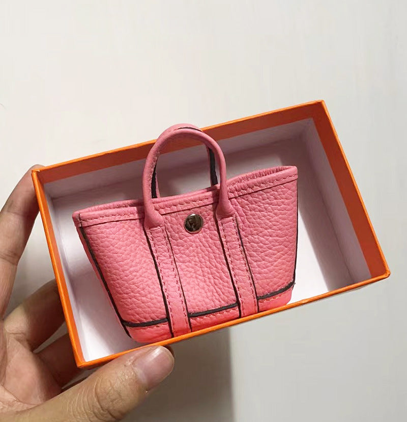 Mini Tote Bag Charm and AirPods Pro Holder in Top Grain Leather detail image 16