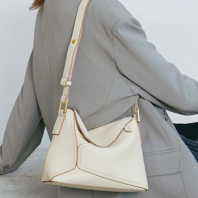 Geometric Dumpling Leather Crossbody Bag with Adjustable Strap detail image 19