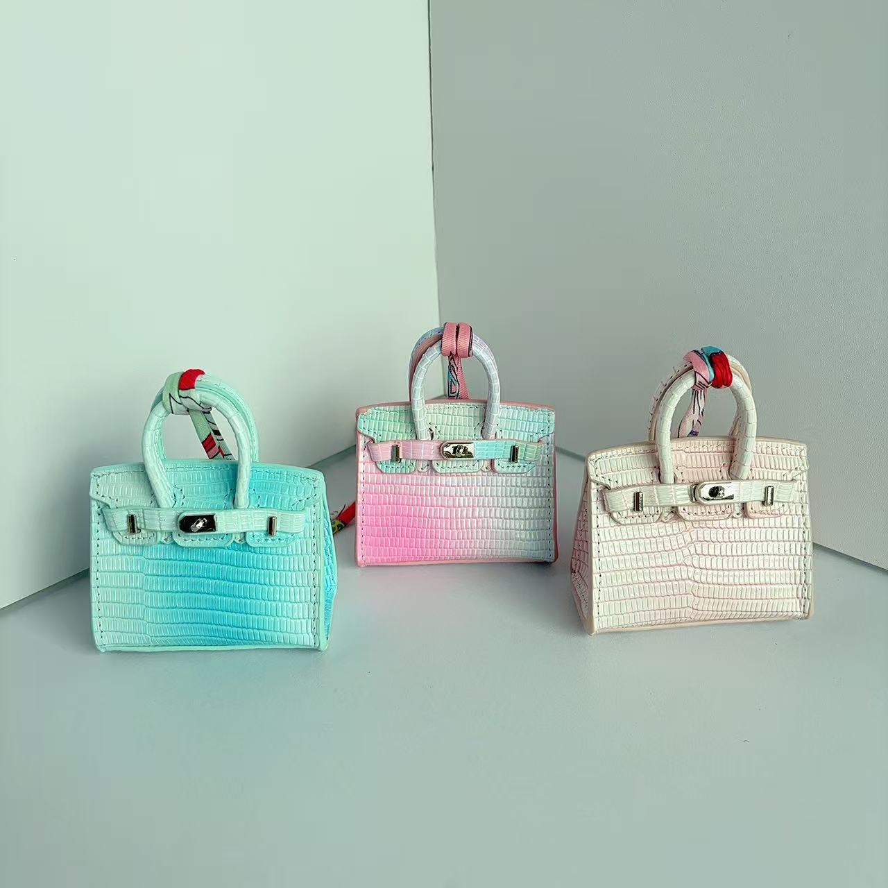 Mini Top Handle Bag Charm Keychain – Real Leather Earphone Case in Gradient & Speckle Colors product image 1