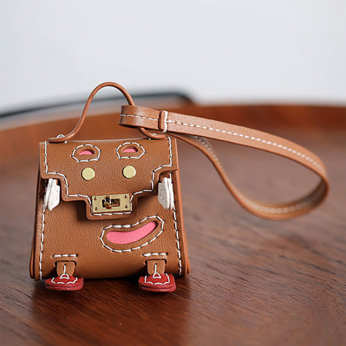 Handsewn Leather Mini Top Handle Bag Charm Keychain in Brown product image 1