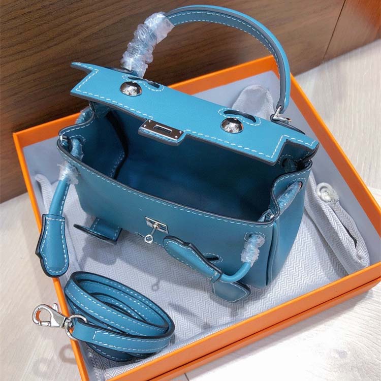 Smile Doll Bag Genuine Leather Mini Handbag with Top Handle and Crossbody Strap detail image 14
