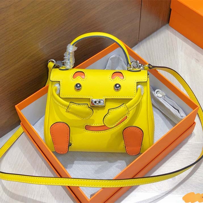 Smile Doll Bag Genuine Leather Mini Handbag with Top Handle and Crossbody Strap detail image 3