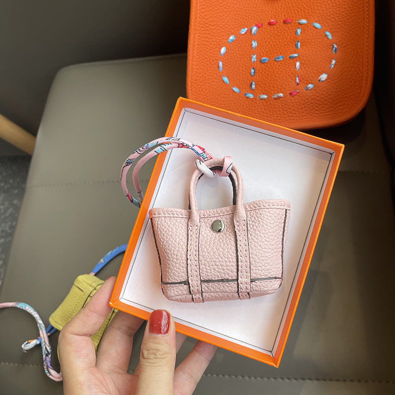Mini Tote Bag Charm and AirPods Pro Holder in Top Grain Leather detail image 6