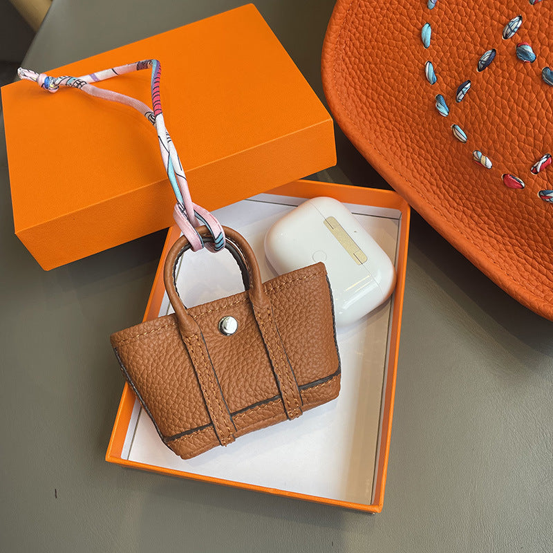 Mini Tote Bag Charm and AirPods Pro Holder in Top Grain Leather detail image 13