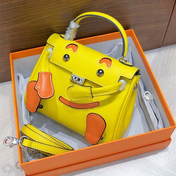 Smile Doll Bag Genuine Leather Mini Handbag with Top Handle and Crossbody Strap detail image 11